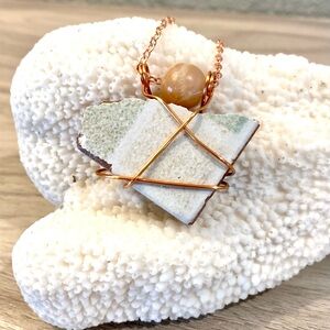 41. Cozumel sea tile necklace with a sunstone bead and rose gold accents